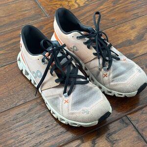 On Running Peach and Black Athletic Shoes